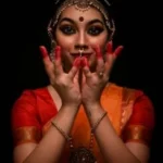 Classical dancer displaying a traditional hand mudra during classical dance classes in Kannur.